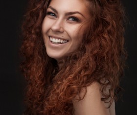 Smiling curly woman HD picture