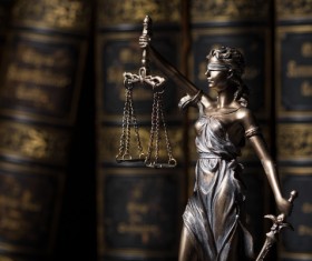 Statue of the goddess of justice and legal books Stock Photo 02