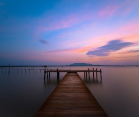 Sunset in the wooden dock Stock Photo 02
