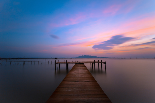 Sunset in the wooden dock Stock Photo 02