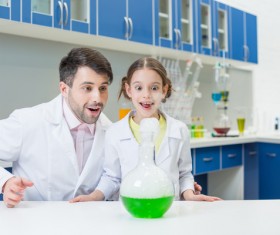 Teachers and students making experiments Stock Photo 03
