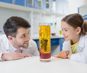 Teachers and students making experiments Stock Photo 04