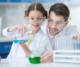 Teachers and students making experiments Stock Photo 05