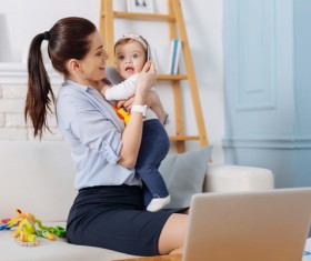 The baby received the surprised expression of the phone Stock Photo
