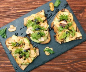 The delicious food on the black chopping board Stock Photo