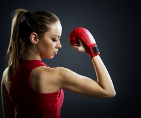 The female boxer showing muscle Stock Photo