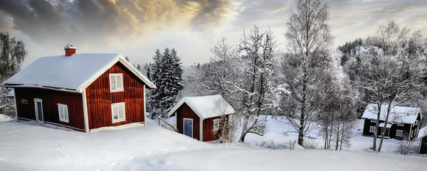 Winter forests and snow-covered houses Stock Photo