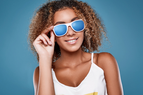 With sunglasses curly girl Stock Photo