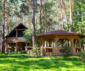 Wooden houses and pavilions in the forest Stock Photo