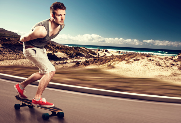 skateboarder on the road Stock Photo