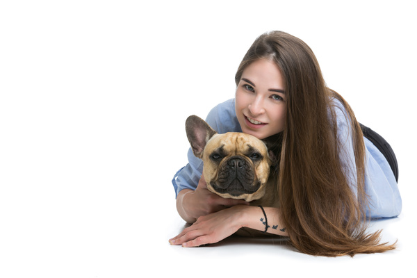woman embrace French Bulldog Stock Photo