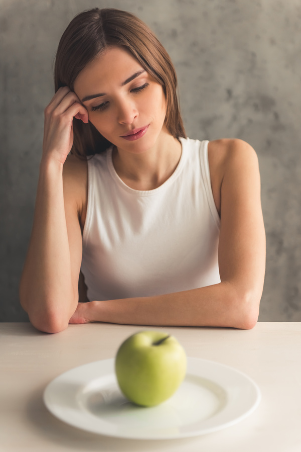 Apple slender woman with the face of Stock Photo