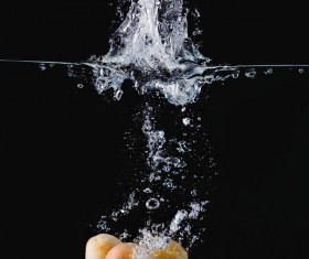 Apricots falling into the water HD picture