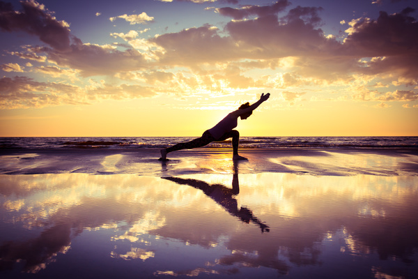 Backlight shooting sunrise beach practicing yoga woman Stock Photo 02