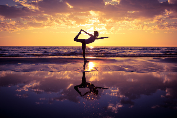 Backlight shooting sunrise beach practicing yoga woman Stock Photo 03