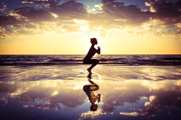 Backlight shooting sunrise beach practicing yoga woman Stock Photo 04