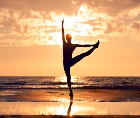 Backlight shooting sunrise beach practicing yoga woman Stock Photo 06