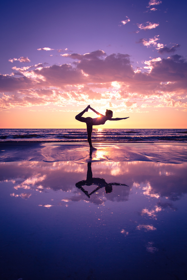 Backlight shooting sunrise beach practicing yoga woman Stock Photo 15