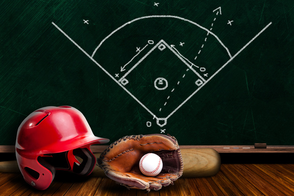 Baseball equipment and blackboard game plan Stock Photo