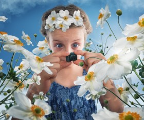 Children who are photographed with a miniature camera Stock Photo