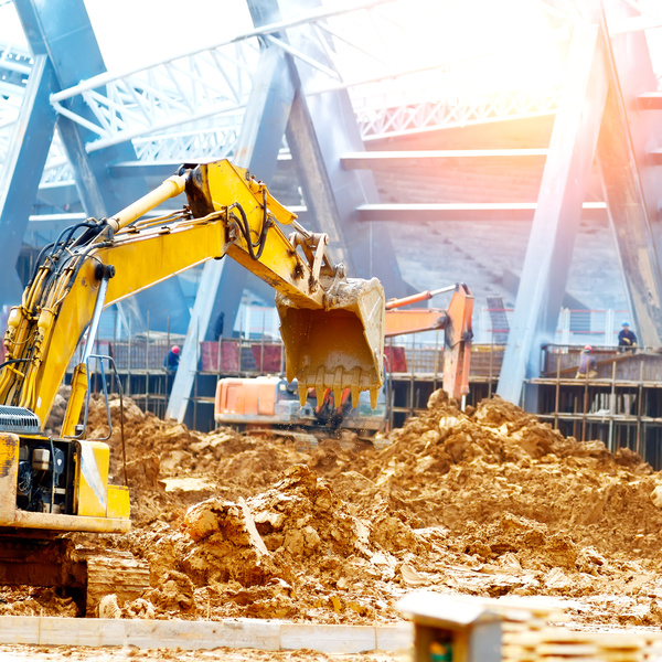 Construction site busy excavator Stock Photo