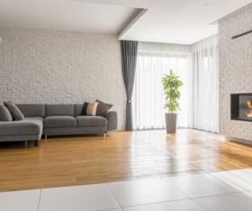 Corner sofa with large plant fireplace living room Stock Photo 02