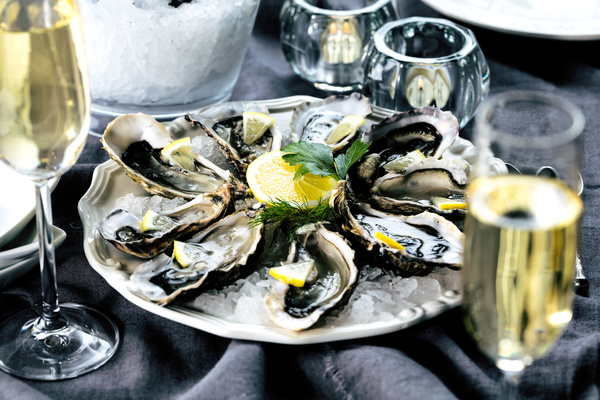 Delicious oysters and wine Stock Photo