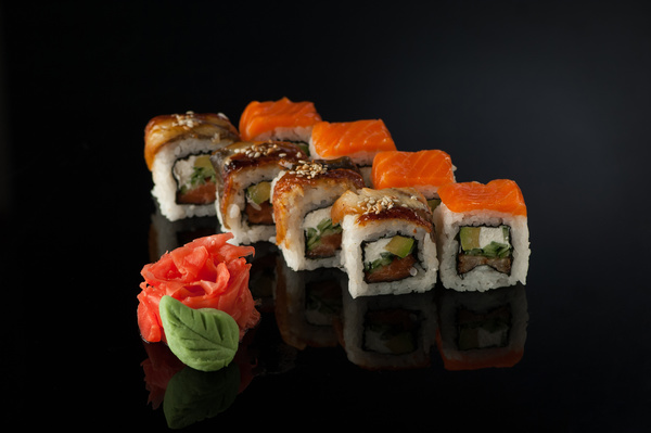 Delicious sushi on a black background Stock Photo 01