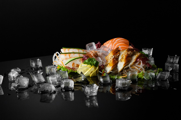 Delicious sushi on a black background Stock Photo 03