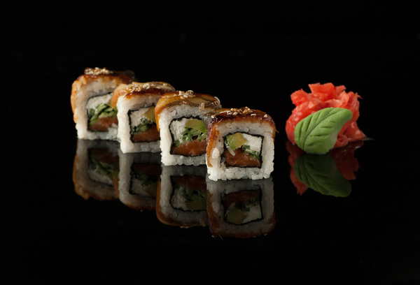 Delicious sushi on a black background Stock Photo 06