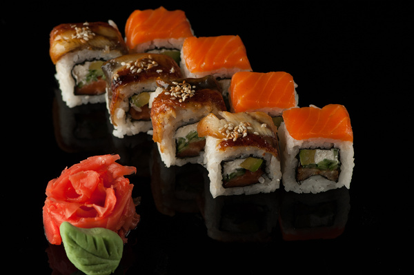 Delicious sushi on a black background Stock Photo 08