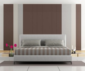 Elegant bedroom with bedside flower arrangement Stock Photo