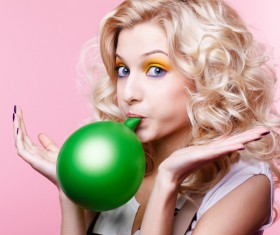 Eye beauty blonde blowing balloons
