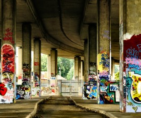 Graffiti works on viaduct piers Stock Photo