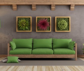 Green sofa pad with wall plant painting Stock Photo