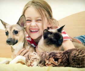 Happy children and animals Stock Photo