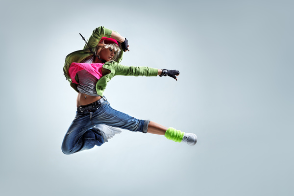 High jumping dynamic female dancer Stock Photo