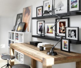 His study desk and wall photos Stock Photo