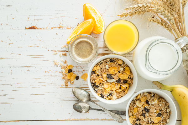 Instant cereal with orange juice and milk Stock Photo