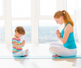 Mother and daughter face to face meditation HD picture
