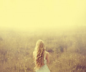 Nostalgic blonde woman Stock Photo