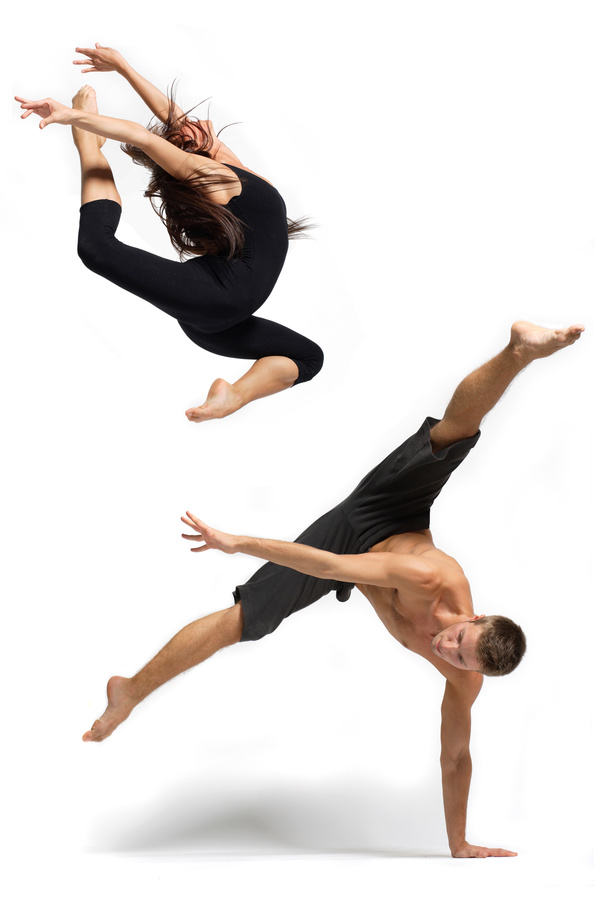 One hand stays with leaping dancers Stock Photo