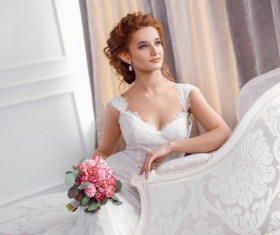 Sitting on the couch with beautiful bride Stock Photo 02
