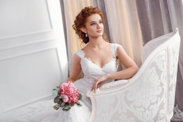 Sitting on the couch with beautiful bride Stock Photo 02