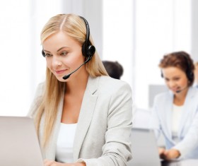 Smiling customer service lady Stock Photo