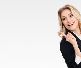 Smiling young woman looking back Stock Photo