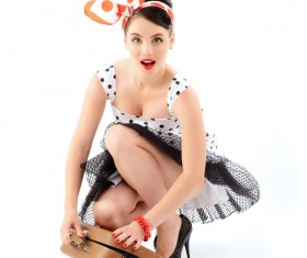 Squat down to pick up bags of beauty Stock Photo