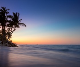 Sunset tropical island beach view Stock Photo 02