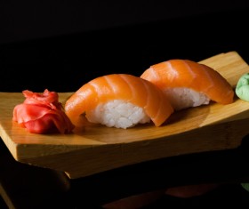 Sushi in a plate on a black background Stock Photo 01