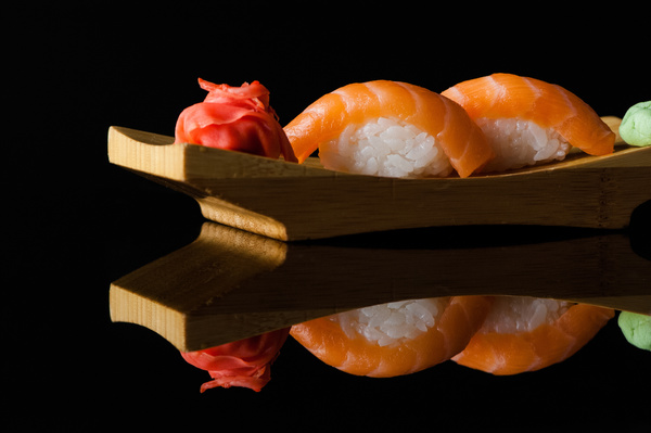 Sushi in a plate on a black background Stock Photo 02